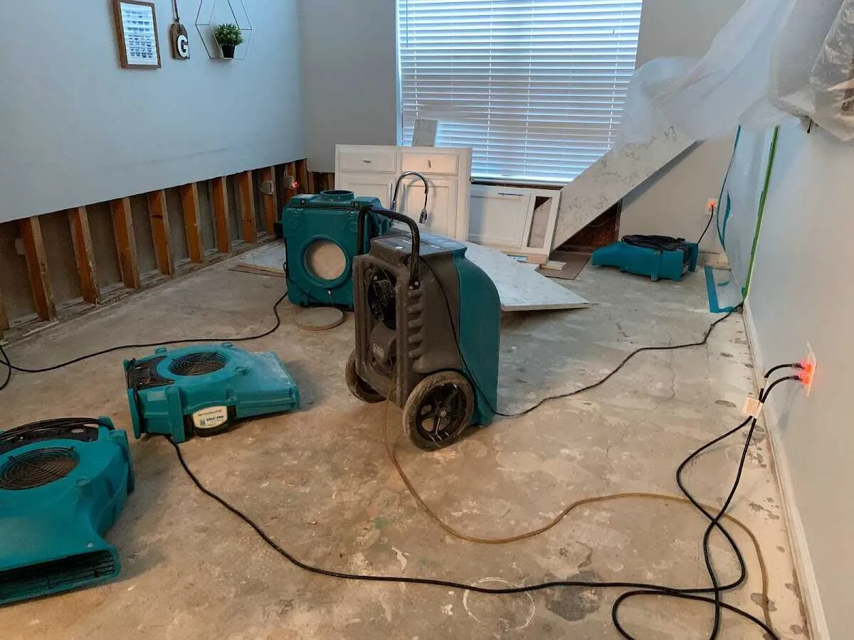 Dehumidifier in flood-cut room for Water Damage Restoration in Fairmount